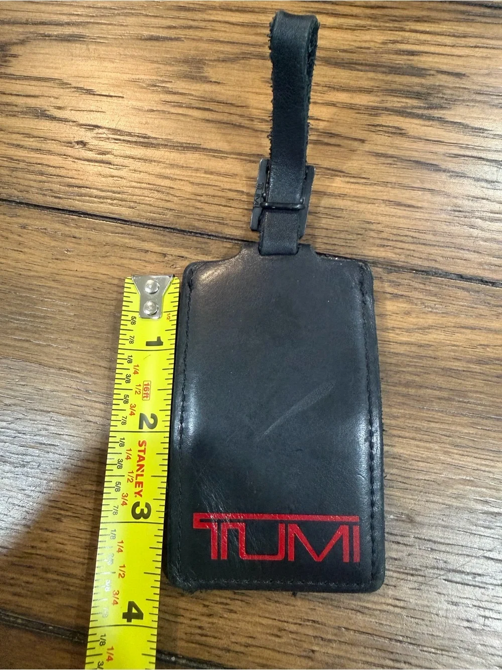 Tumi Black Leather Luggage Tag with Red Logo Accent